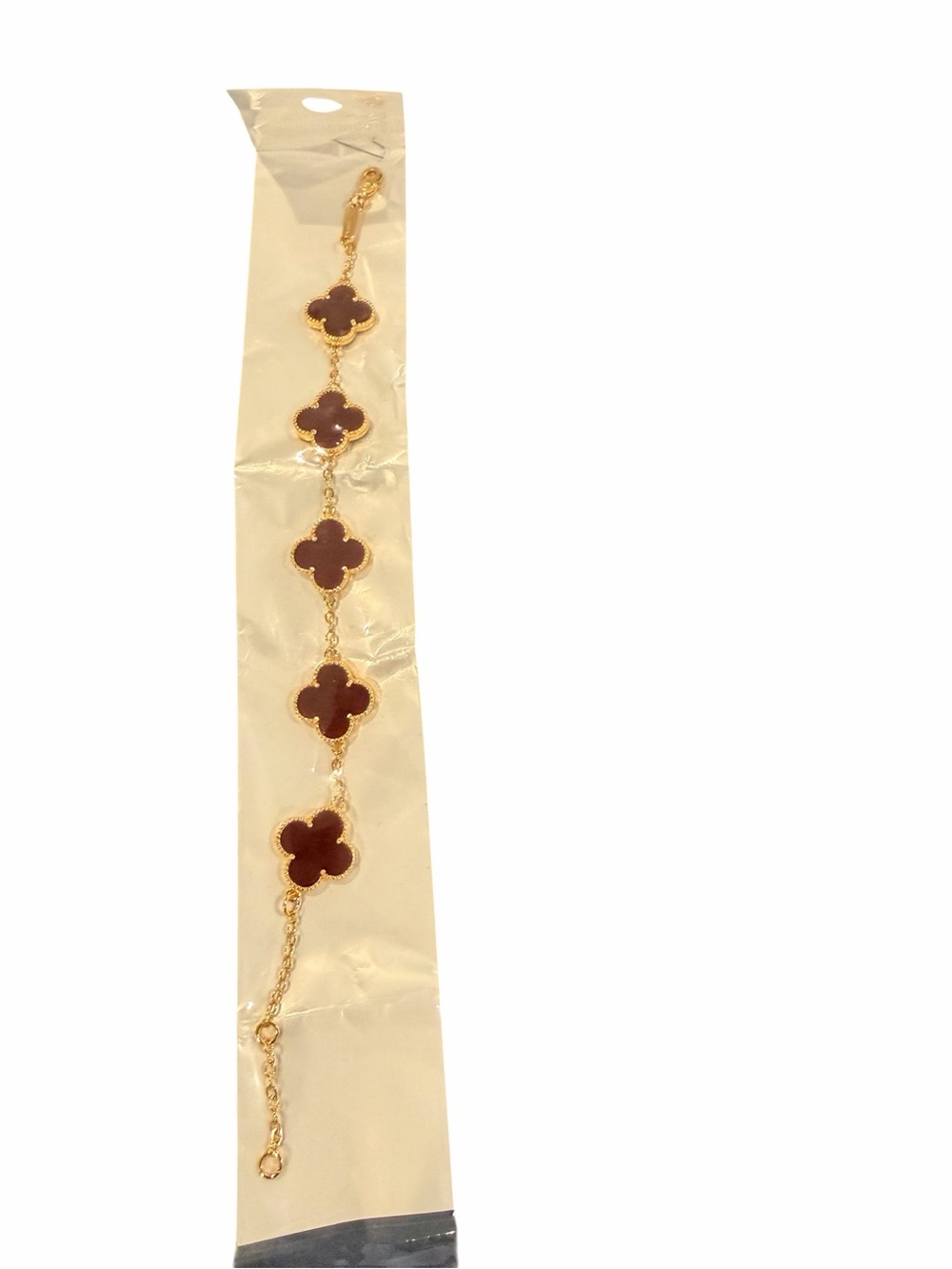Gold Tone Bracelet with Brown Clover Motifs